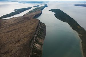The Pethei Peninsula separates the basins of the East arm of Great Slave Lake.  McLeod Bay is to the north and Christie Bay to the south.       