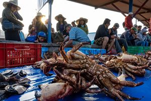 Fishermen and their products in Ancón, Perú.