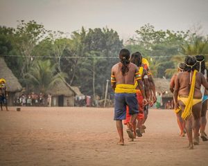 Photo of indigenous people walking.