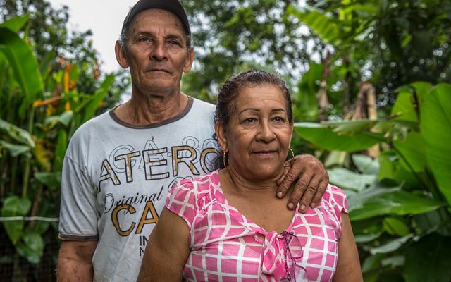 August 11, 2018. San Martin, Meta, Colombia.  Rosana Adamez Hernandez (58) with her husband Edilson Ortiz Arango (61) who have been married for 25 years. She and Edilson with their children were displaced from Vista Hermosa, Meta in 1999 when the Colombian Government and FARC were undergoing peace negotiations and agreed to create a demilitarized zone in the region. FARC started to visit Edilson’s farm and he fear for his safety and of that of his family and left his farm and moved to Bogota. As part of reparation program for internally displaced victims in 2004. Edilson joined the Sustainable ranching program where he has been adopting sustainable practices to increase production, profits and climate changing patterns.