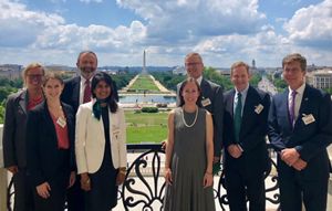 Staff and trustees from The Nature Conservancy in Massachusetts pictured at the U.S. Capitol with the National Mall and Washington Monument in the background.