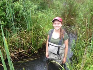 Volunteer Julia Randall monitoring beaver activity at Jug End Preserve.