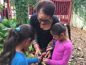 Dr. Mamie Parker with two students in Houston. 