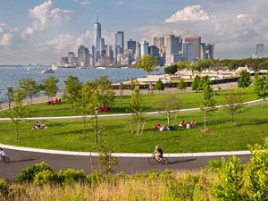 Park-goers enjoy the view at Governors Island in the New York Harbor.