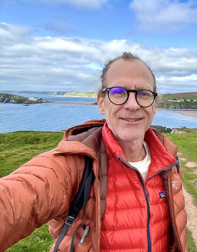 a selfie of Martin Callow in front of a lake.