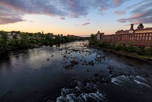 The view of the Merrimack River upstream from the Granite Street Bridge in Manchester, NH.