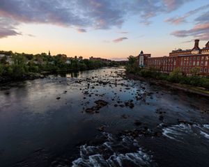 The view of the Merrimack River upstream from the Granite Street Bridge in Manchester, NH.