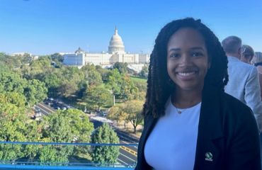 A photo of Michelle in front of the US Capital building.