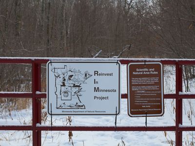 Sign on a gate describes the SNA program.