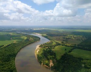 Overview of the Mississippi River surrounded by agriculture fields.