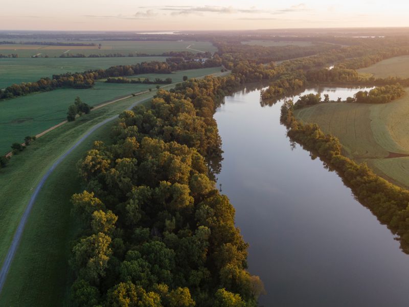 Aerial photo of the Mississippi River flowing past fields.