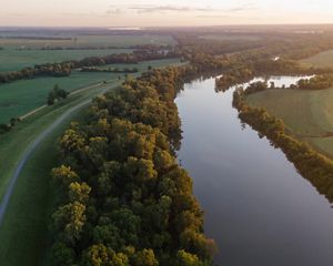 Aerial photo of the Mississippi River flowing past fields.