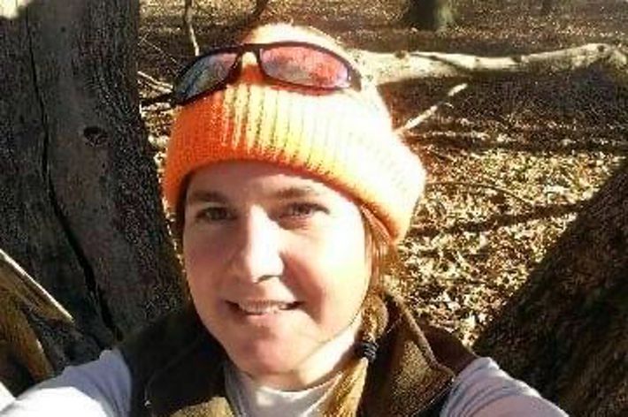 Candid selfie of Molly Anderson taking while hiking.