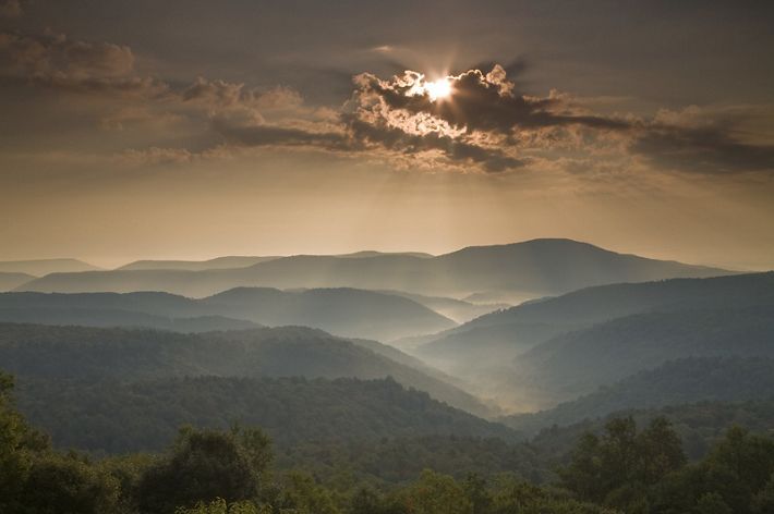 Photo of mountains in the sunset.