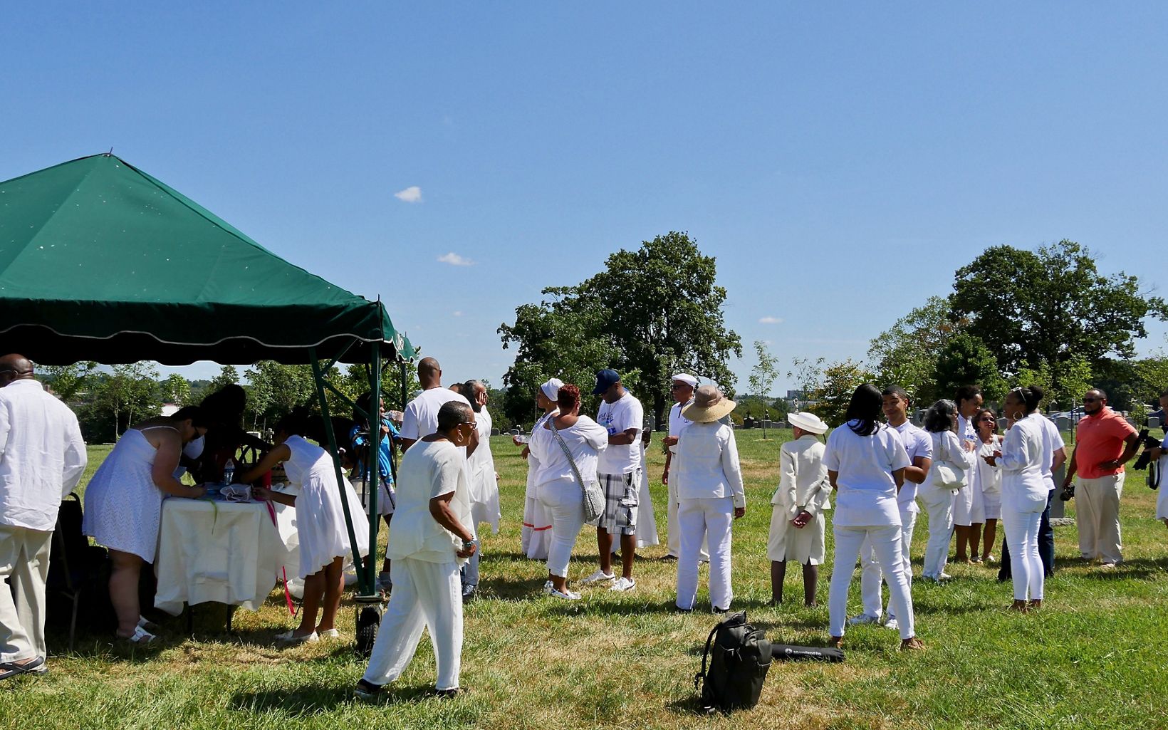 Descendants of freedmen John and Arabella Weems gather at Mt. Olivet Cemetery to honor the legacy of their ancestors, August 9, 2019.