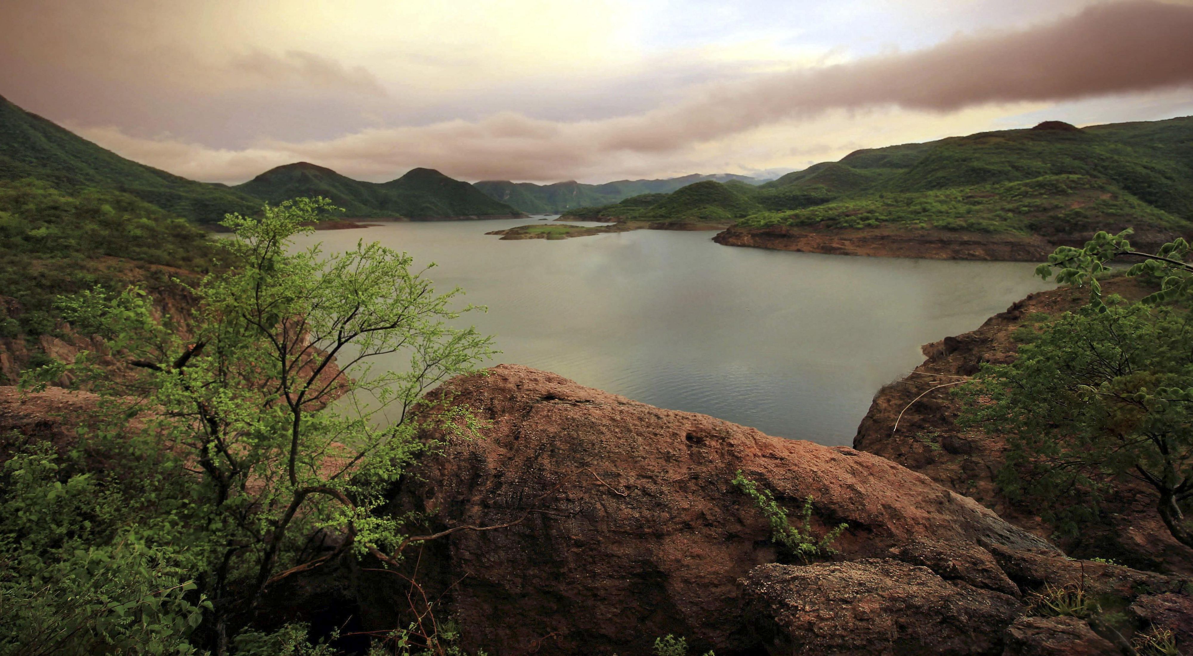 A lake in the mountains of Jalisco, Mexico at sunset