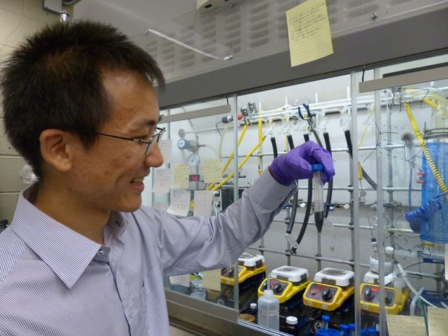 Haoran Yang in front of one of his nanotech waste heat transfer experiments.