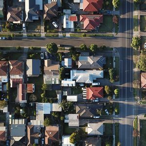 top down shot of housing development with trees