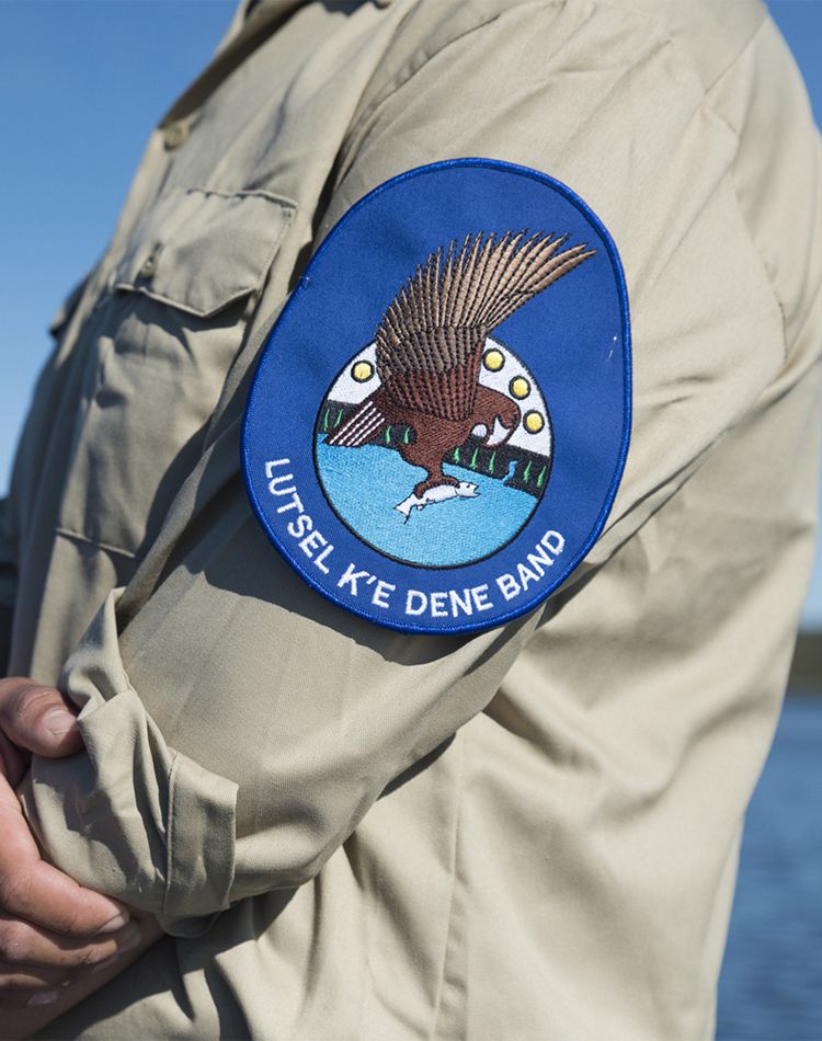 A close up of a ranger's arm with an eagle patch