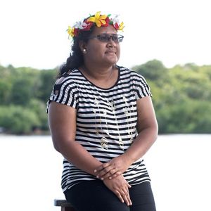 portrait of woman wearing flower crown on head
