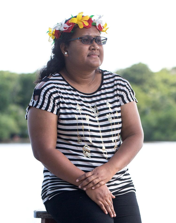 portrait of woman wearing flower crown on head