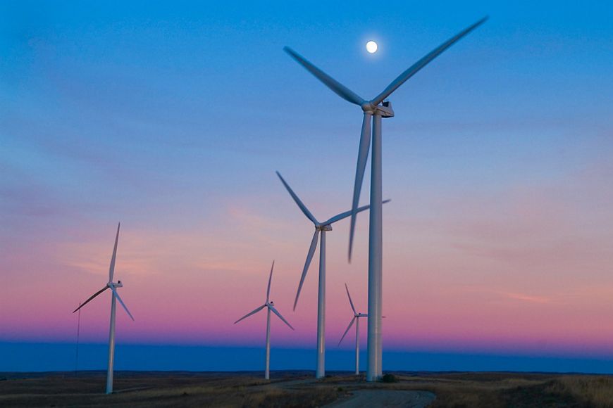 Wind turbines at sunset.