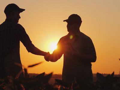 Two men shaking hands.