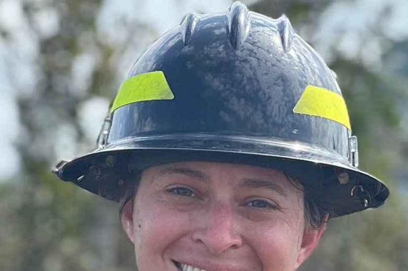 A headshot of Natasha Whetzel in fire gear.