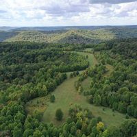 An aerial view of the forested hills of the Edge of Appalachia Preserve System.