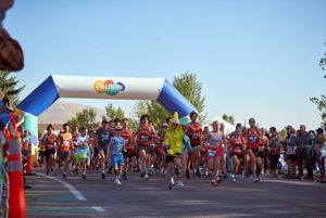 A group of people running a race.