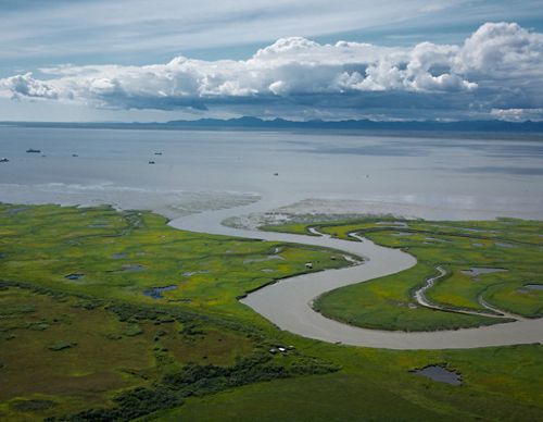Aerial view of the Alaskan landscape of Bristol Bay and mountains.