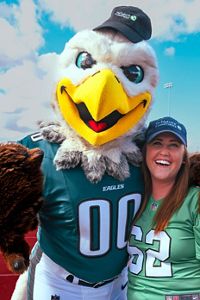 Philadelphia Eagles mascot Swoop with TNC's Kelsey Cannon, Associate Director of Philanthropy in Pennsylvania and Delaware.