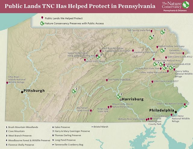 Topographic map of Pennsylvania. Red pins mark public lands TNC has helped to protect. Numbers highlight TNC preserves. Major rivers and cities are also highlighted.