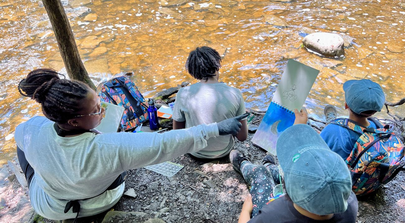 Art students painting new water