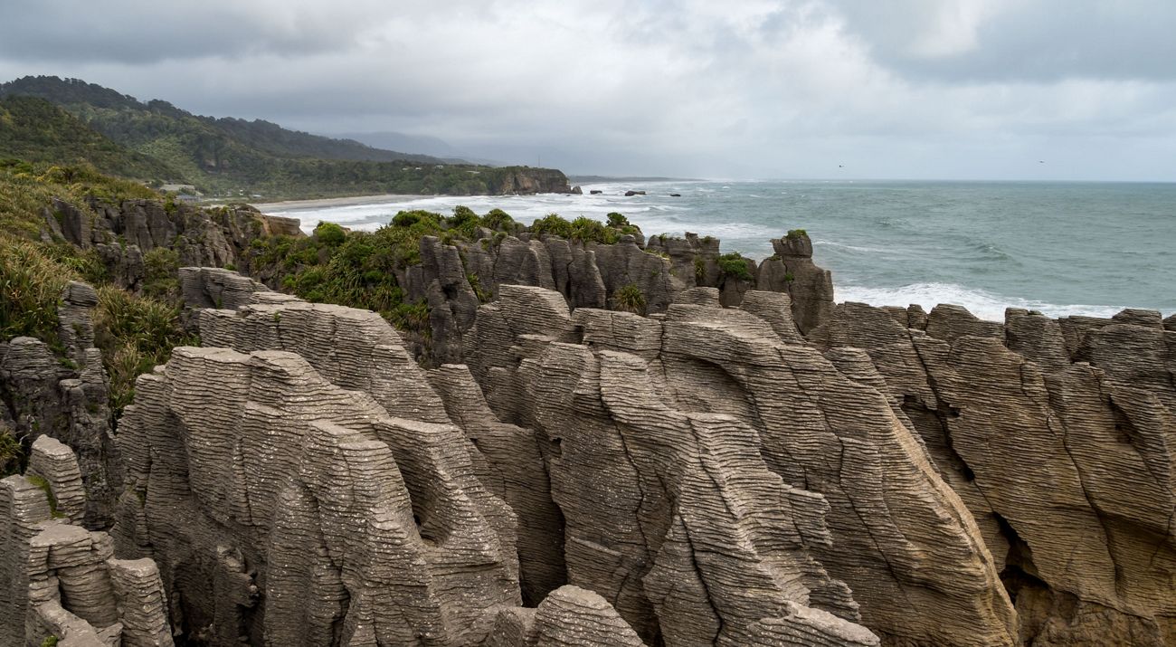 pancake rocks on a shoreline.