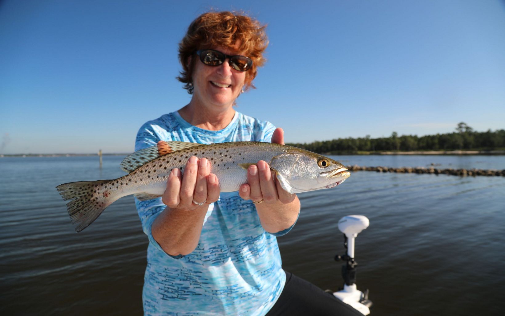 Sea Trout Caught Off the Reef Anne Birch, TNC FL's oceans and coasts strategy director, fished the reefs to see how they are supporting the natural ecosystem. © Russell C. Mick