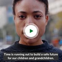  Video thumbnail of a person centered looking straight at the camera with the video captions reading 'Time is running out to build a safe future for our children and grandchildren.'