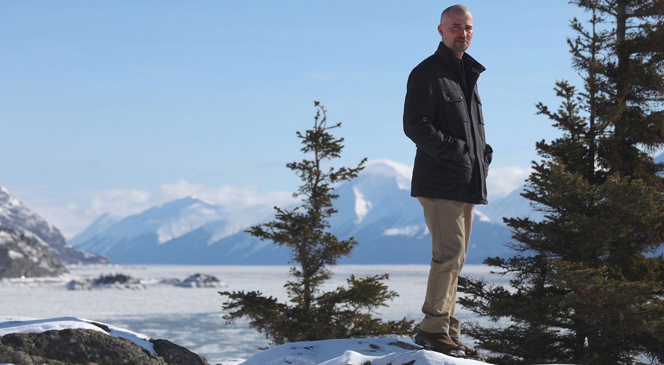 TNC Bristol Bay program director Rayn Aaberg stands outside.