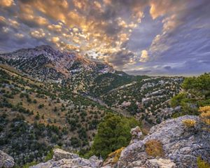 A mountain at sunset.