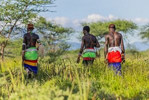 Three Morans in a grassland in northern Kenya. © Anthony Onyango/TonyWild