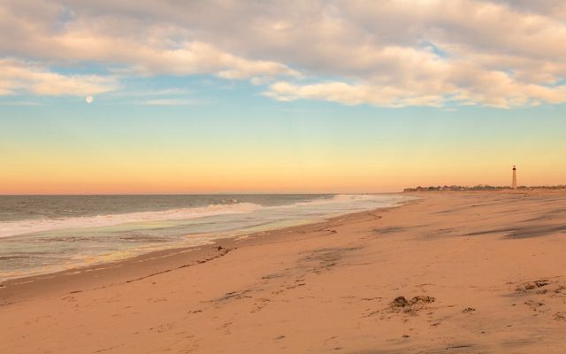 Beach with lighthouse.