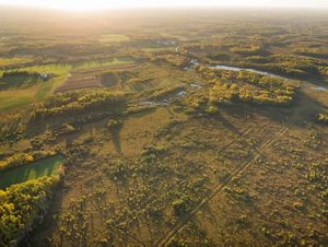 Aerial view of farms and forests along the Snake River in Minnesota.