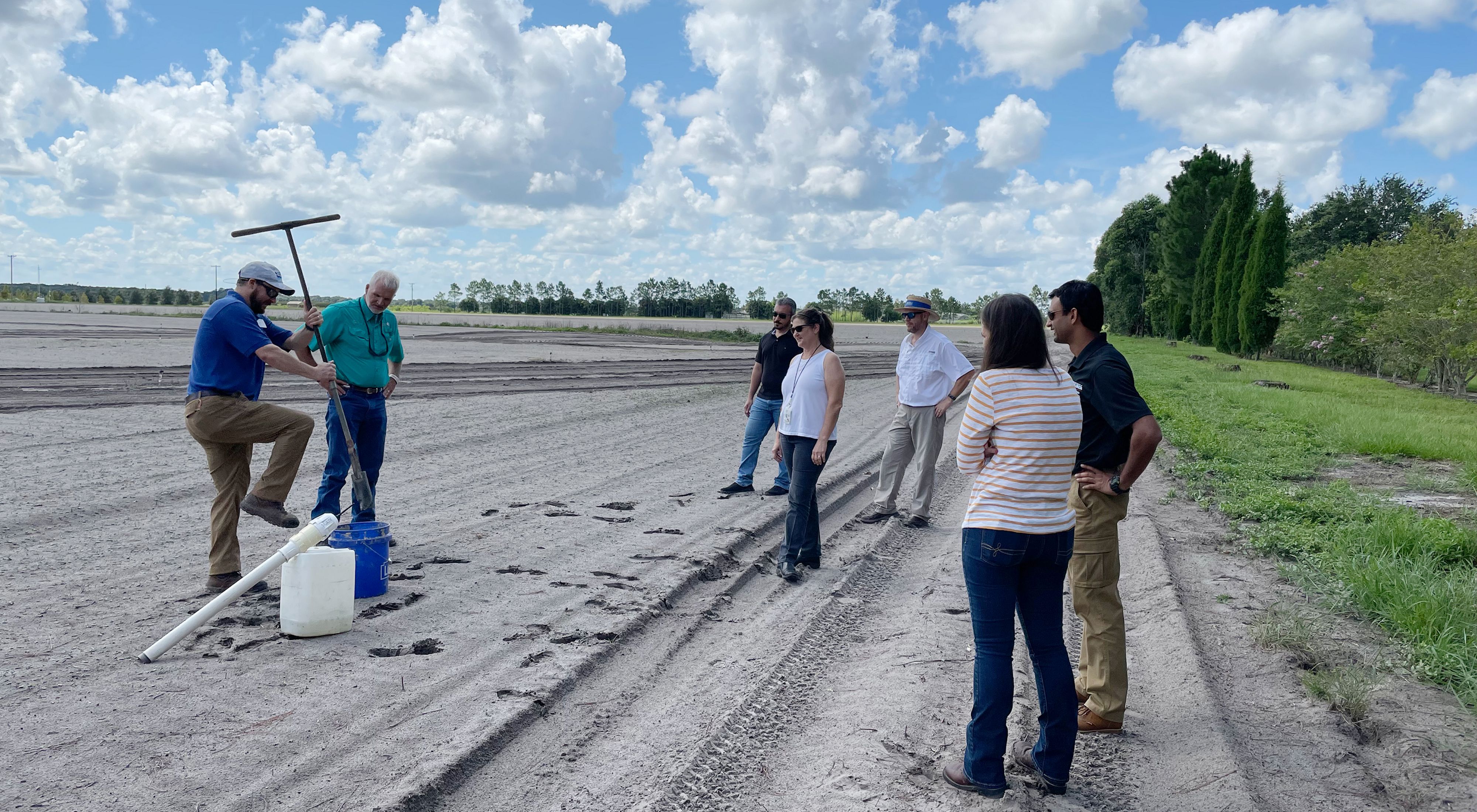 TNC and partners demonstrate the installation of a soil moisture probe on a Florida farm. 