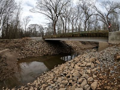 Fish friendly bridge over a river.