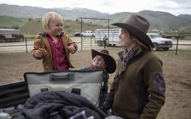 Jessica Cardon jokes with two children at Beard Ranch.