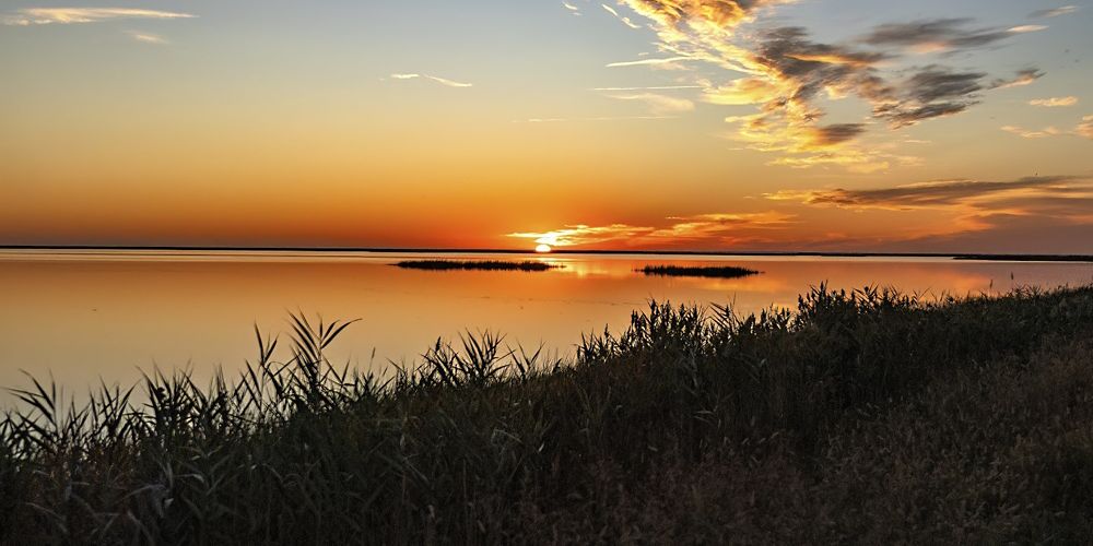The sunsets over the Delaware Bay.