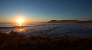 Sunrise over a bay at Dangermond Preserve.