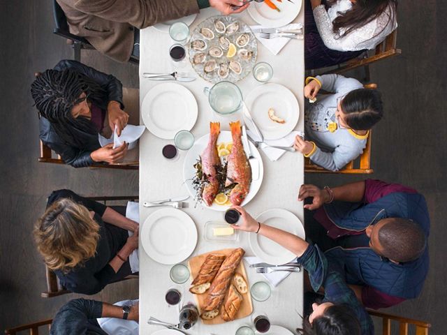 A table is set with foods grown or produced by some of the TNC partners who are working to make food more sustainable, New York City.
