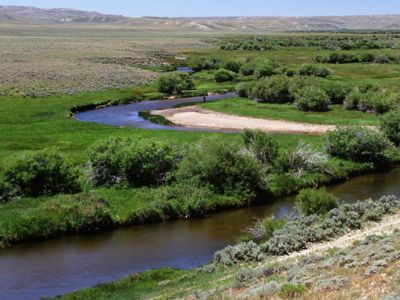 A river winding through a high desert landscape.