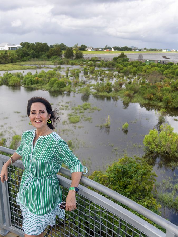 Jennifer Van Vrancken in front of a marsh